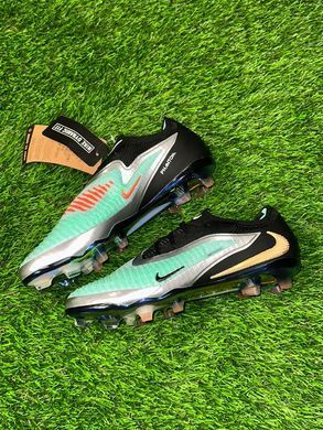 Футбольні копи Nike Phantom 6 Low Elite FG Firm Ground чорно-бірюзові р. 39 1511 фото